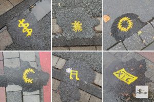 Viele der Asphaltkleckse sind mit gelben Symbolen verziehrt (Collage: Michael Bührke)