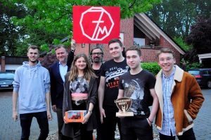 Henning Wehland (Mitte) mit "7 Miles", der Gewinnerband des Musikwettbewerbs "Landwirtschaft rockt". (Foto: Patrick Otte / LV) 